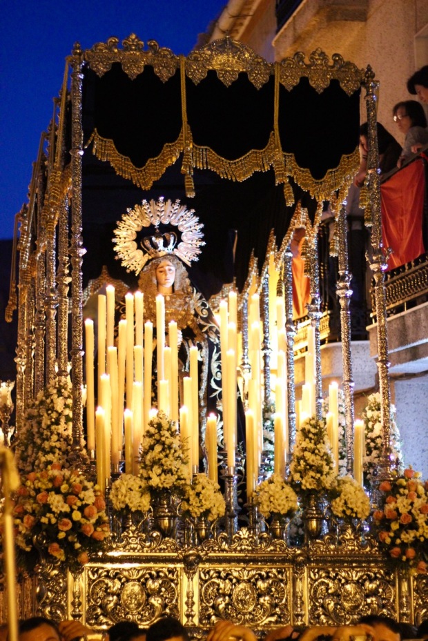 Mary statue being carried through the streets during Semana Santa in Loja Granada, Spain